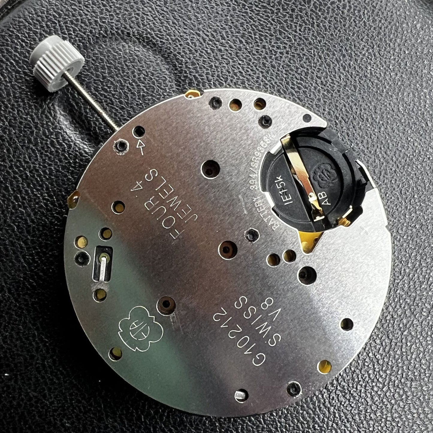 ETA G10.212 quartz watch movement with three hands and date display by ETA, precision timekeeping.