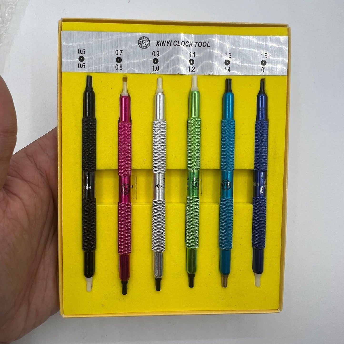 Watch hand presser tool, ideal for precise placement and repair of watch hands and accessories.