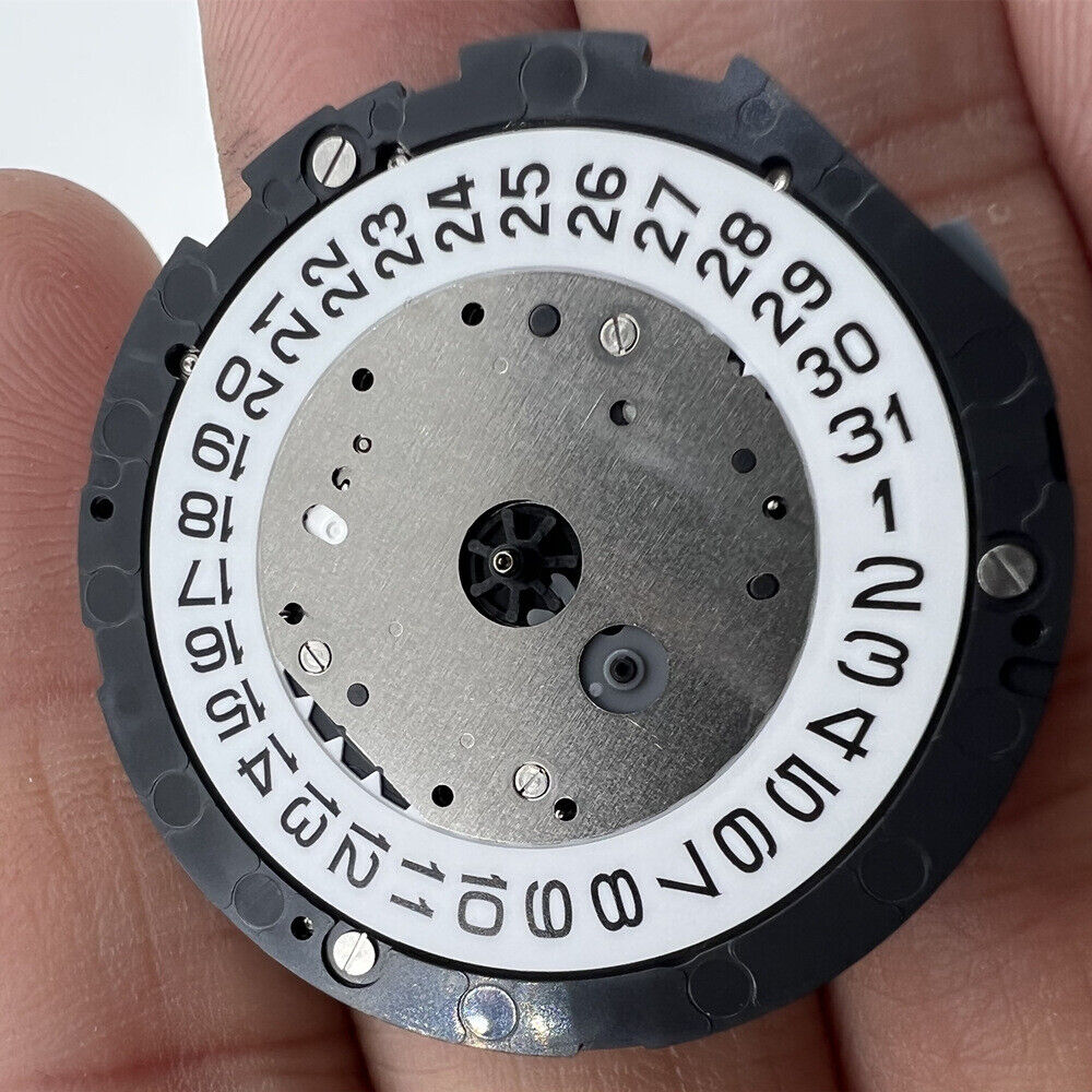 Miyota 6S10 Quartz watch movement with date at 3, 3 hands, small seconds at 6, 9, and 12 positions.