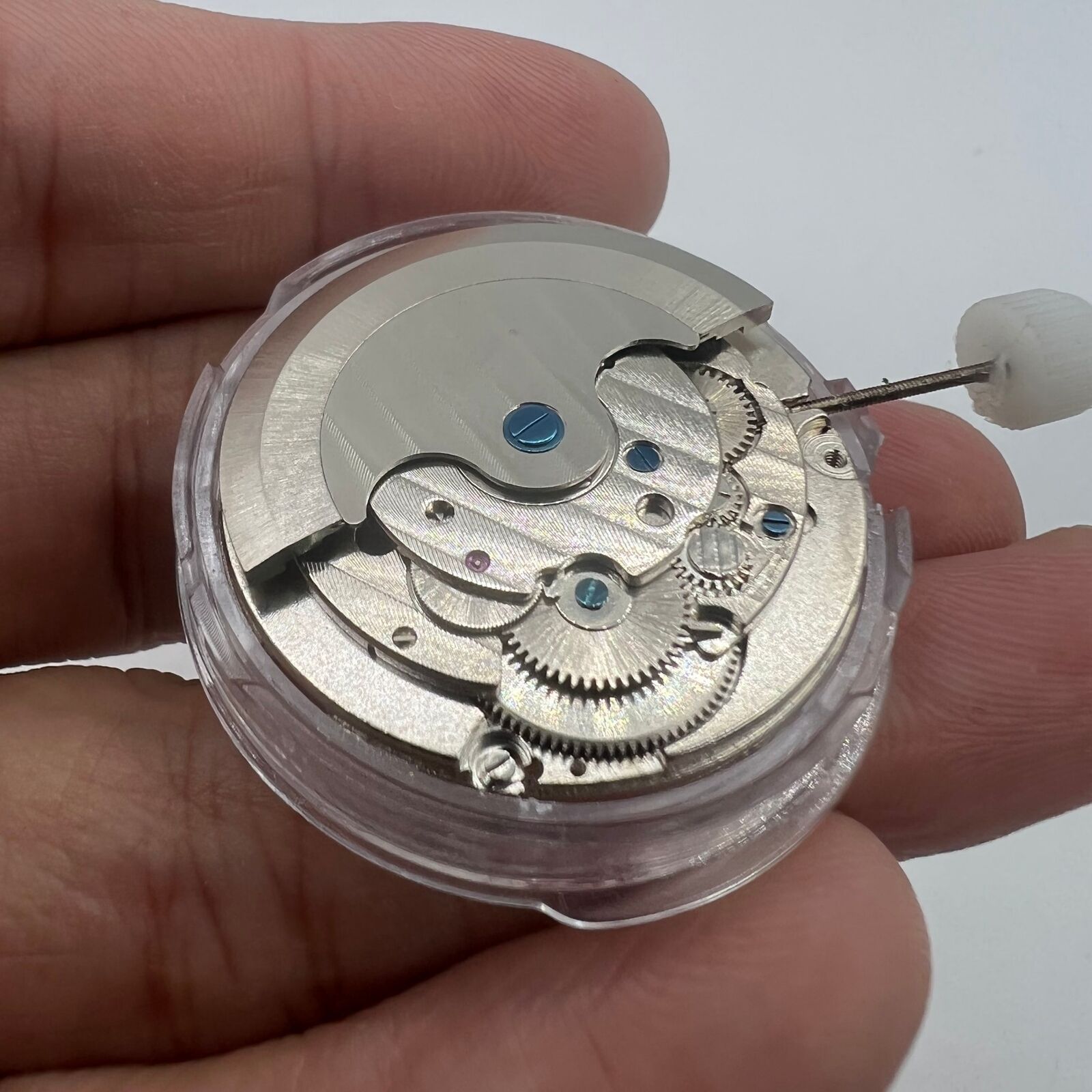 Shanghai LB20 automatic watch displaying moon phase at 6 o'clock and big date at 12, showcasing Chinese craftsmanship.