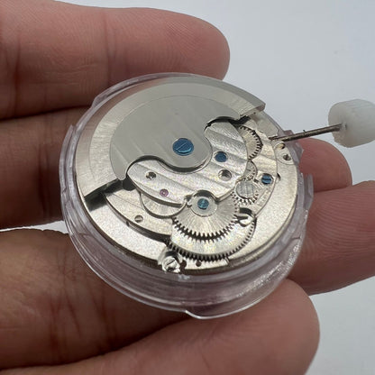 Shanghai LB20 automatic watch displaying moon phase at 6 o'clock and big date at 12, showcasing Chinese craftsmanship.