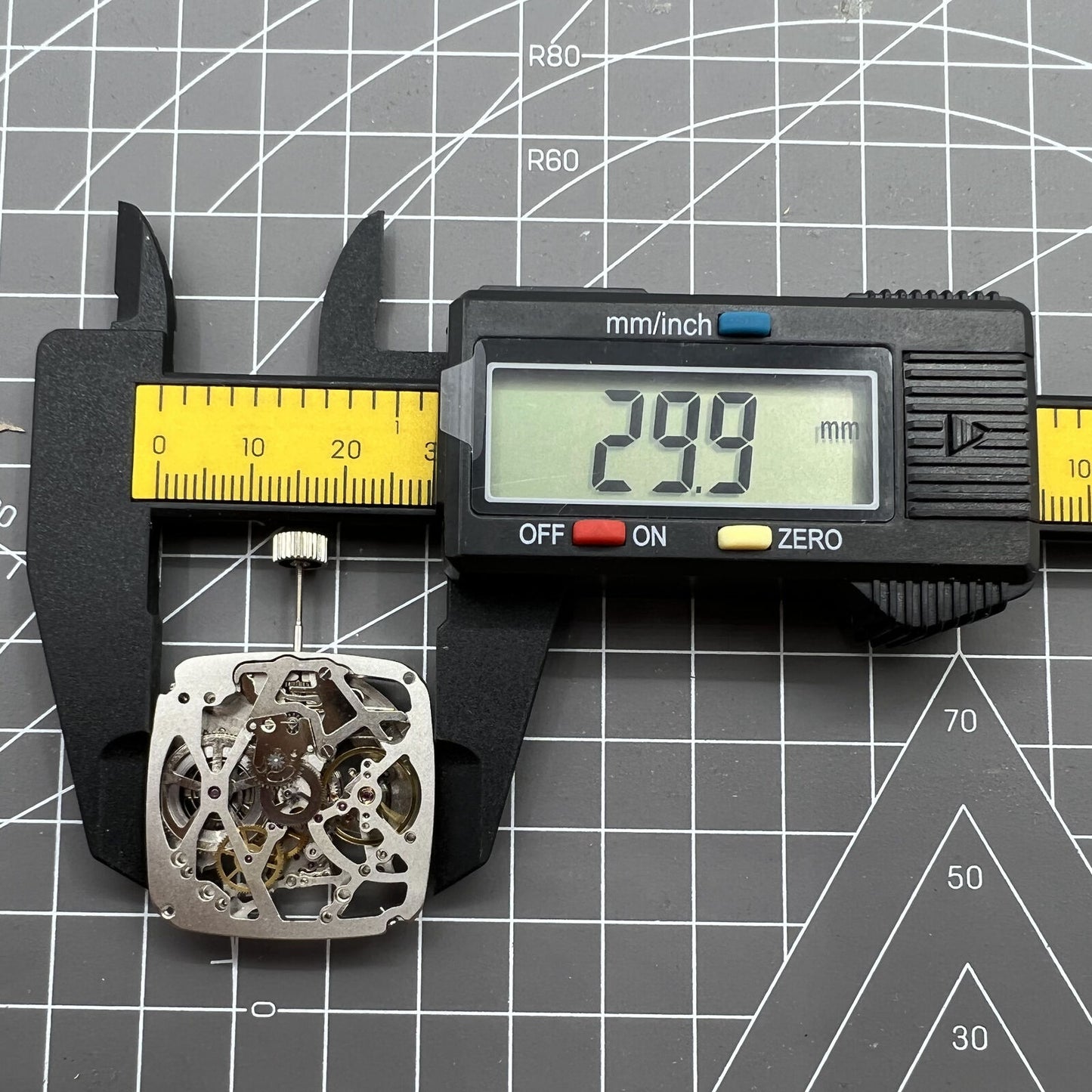 Tianjin Seagull ST25 square watch featuring silver skeleton dial and automatic mechanical movement for precise timekeeping.