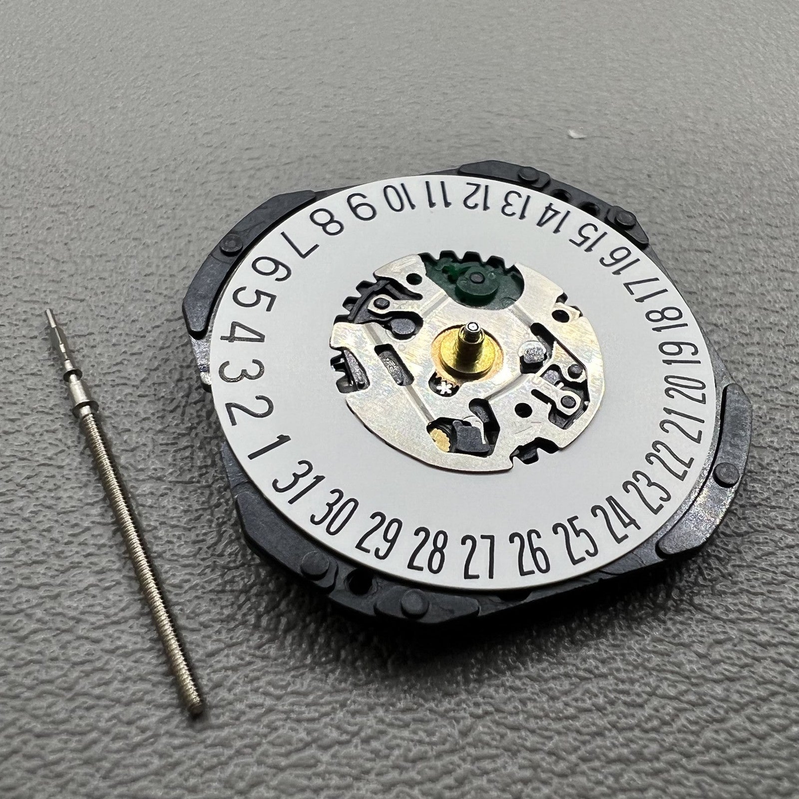 Seiko 7N39C quartz watch movement close-up showcasing precise timekeeping and durable design.