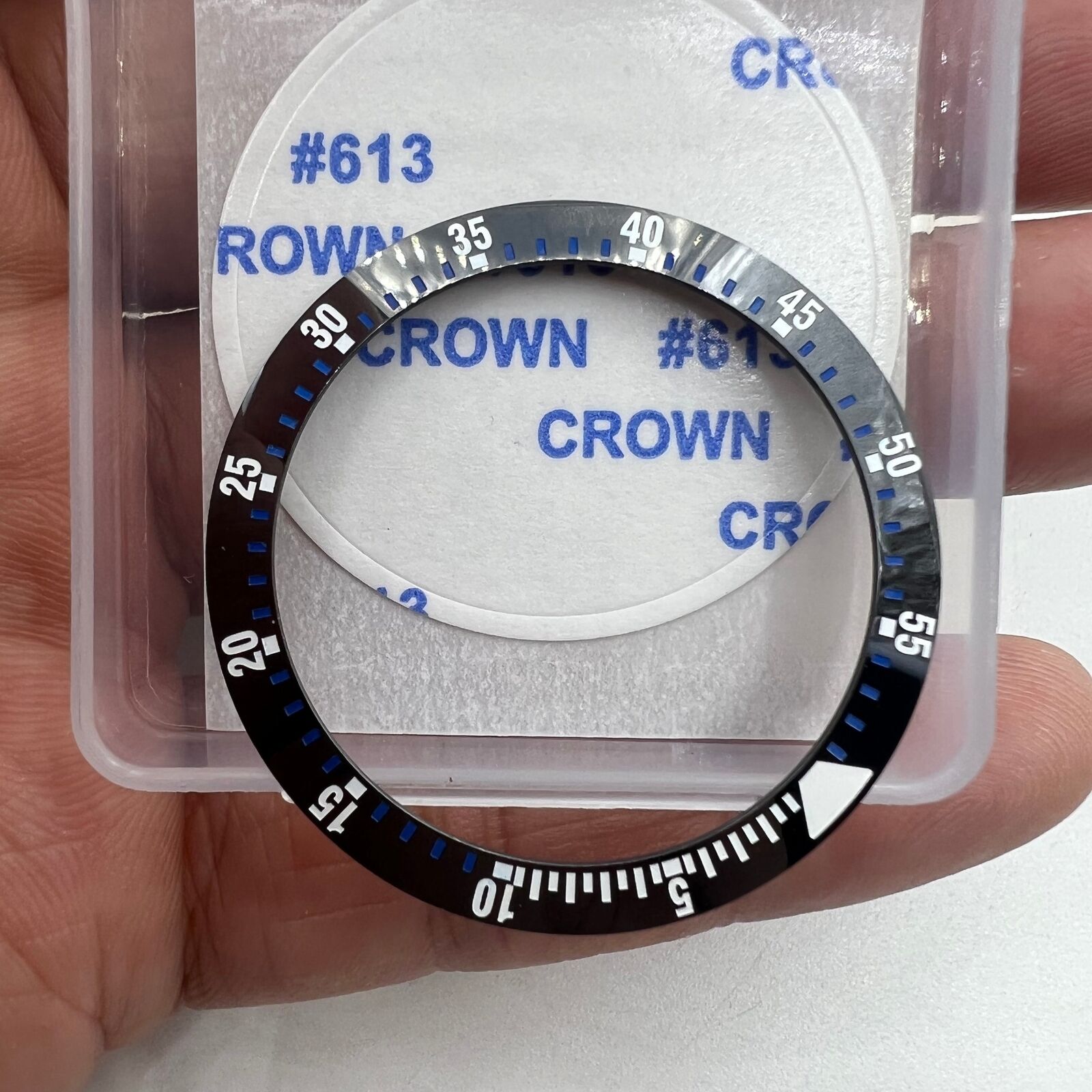 Black ceramic watch bezel insert with blue graduation, 38mm/30.5mm, perfect for watch repairs and customization.