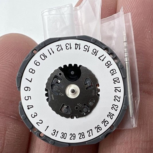 Hattori Epson TMI VJ34B quartz watch movement with date display at 3/6, precision Japanese craftsmanship