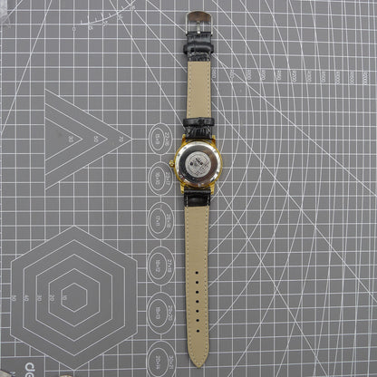 Beijing Double Rhomb mechanical watch with golden case, silver hour markers, and elegant minimalist design.