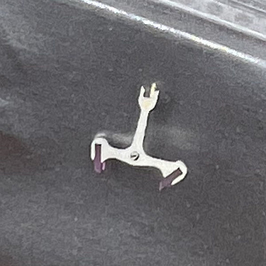 Silver metal 80-hour pallet fork for C07.611 movement by Swiss Made brand, watch accessory details.