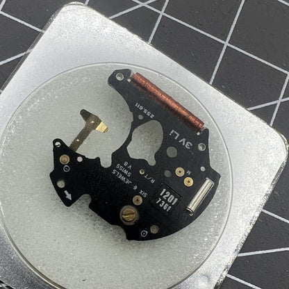 Disassembled ETA 255.111 watch movement circuit board for precise timekeeping replacement parts.