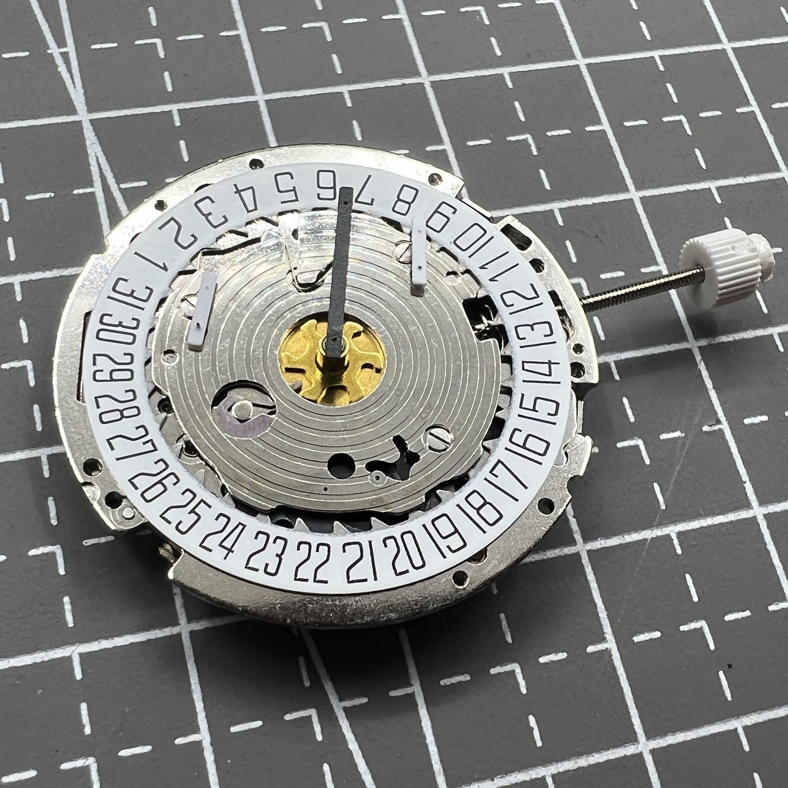 Silber ISA 8171 watch movement with 5 hands and white single calendar dial at 6 o?clock by Silber brand.
