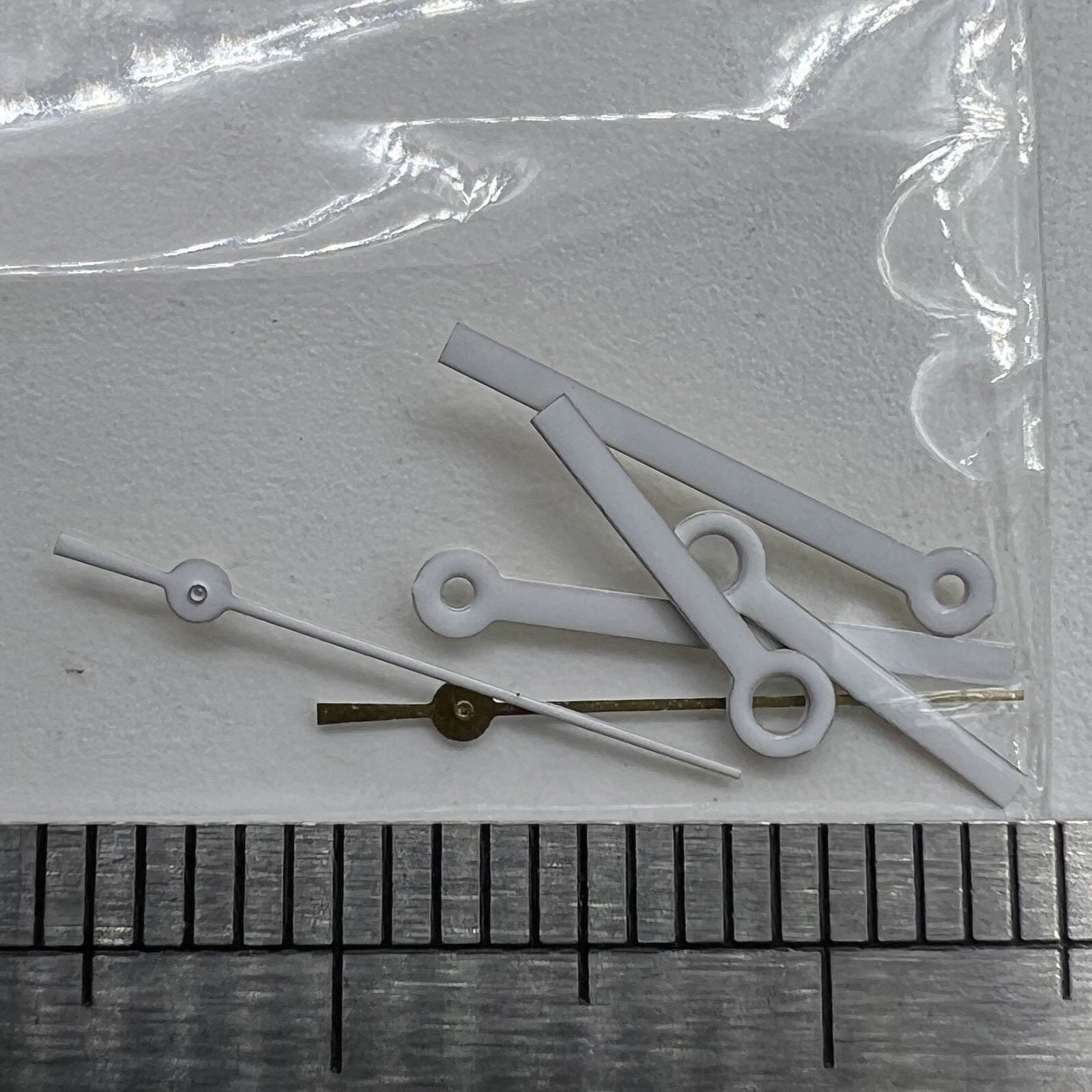White watch hands set for Miyota 2035 movement, precise fit for 15x13x9mm dimensions, branded quality.