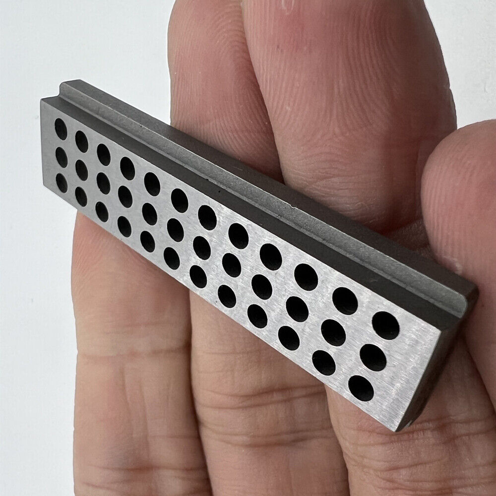 Bergeon 1902 steel staking block for precise riveting in watch repair toolkit.