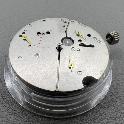 Tianjin ST17 T17 hand-wound watch movement with two hands and power reserve indicator at 10 o'clock.