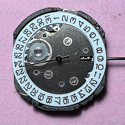 Japan Made 6EC1 quartz watch movement with date at 3, reliable repair part for timepieces.