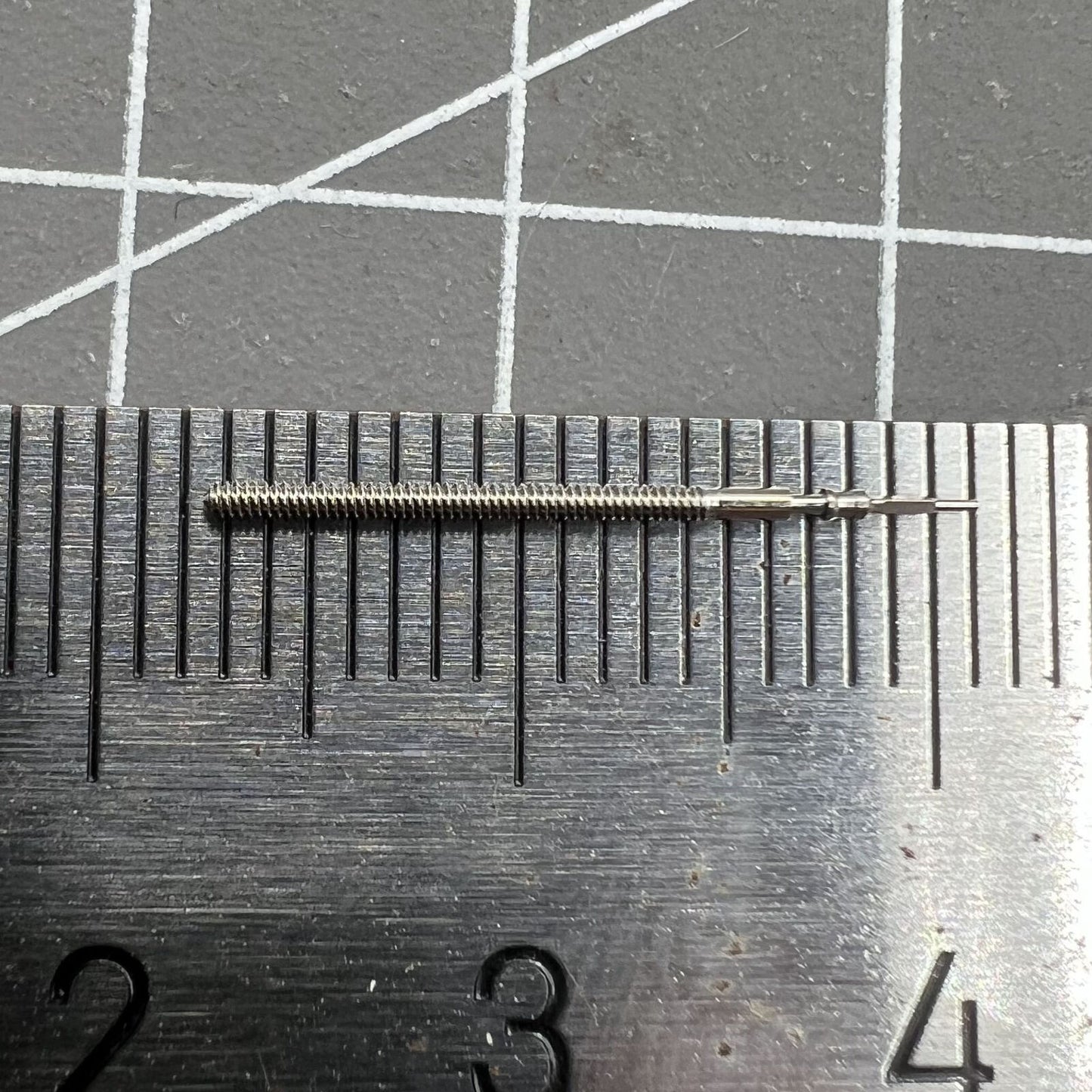 Replacement winding stem for Miyota JS00 JS20 watch movement, precise fit for smooth time adjustment.