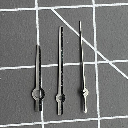 Silver and black watch hands for NH35/NH36/4R/7S movements, no lume, sleek design.