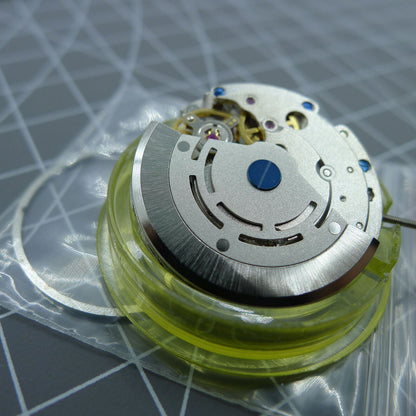 DG2813 silver automatic watch movement with 4 hands and adjustable 24-hour GMT.