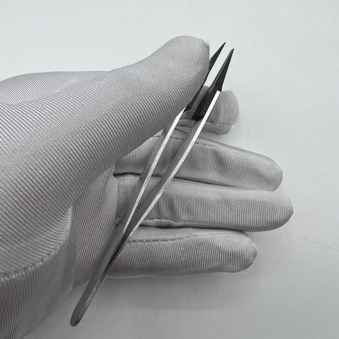 Horotec MSA12.711 Swiss Made carbon fibre tweezers with broad flat tips for precise watch accessory handling.