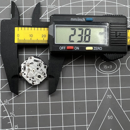 Hattori Epson TMI VX3J VX3JE quartz watch movement, precise Japan-made mechanism for accurate timekeeping.