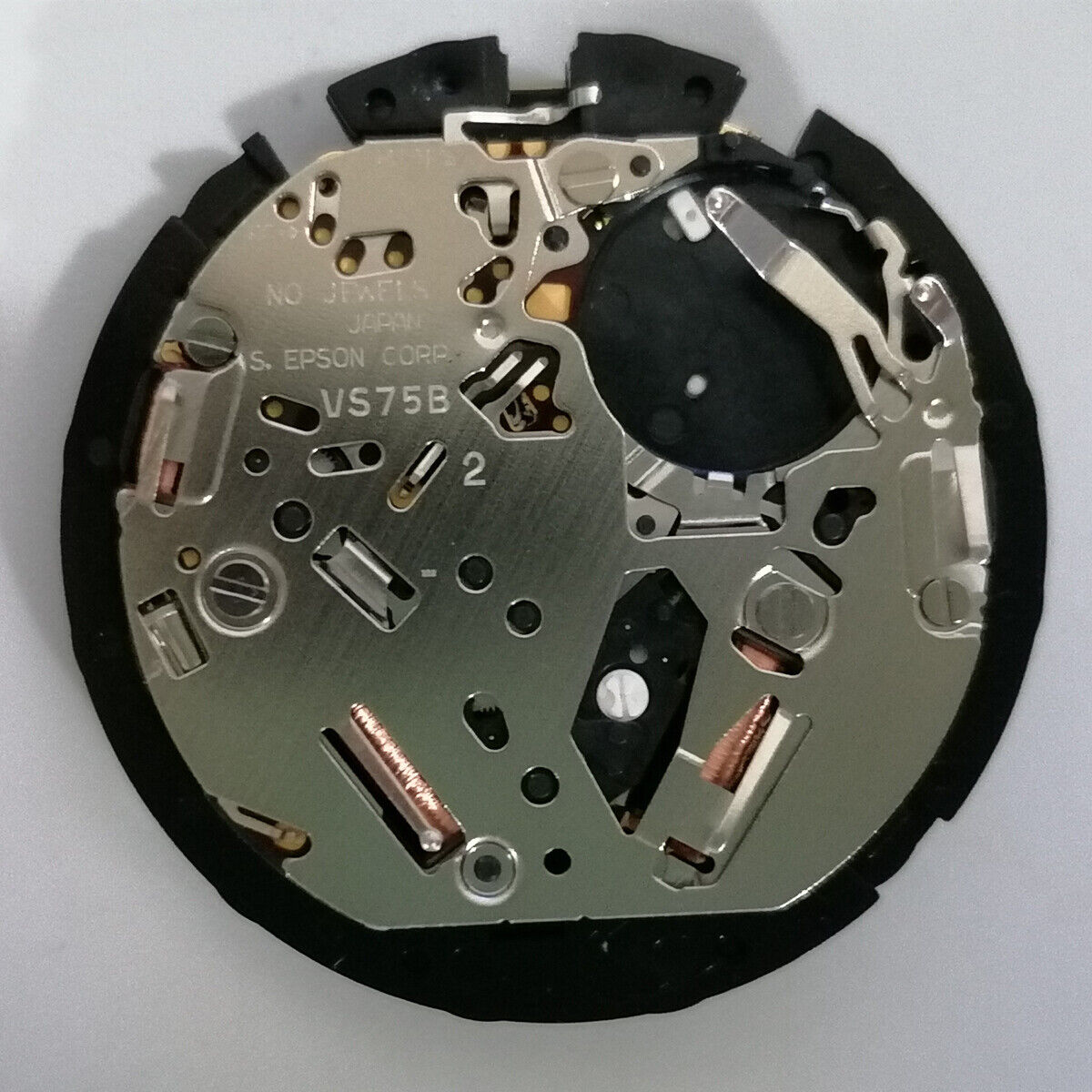 Hattori Epson TMI VS75B solar-powered quartz watch movement, precise Japanese engineering for accurate timekeeping.