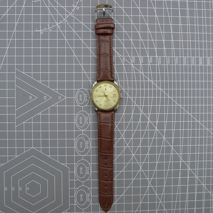 Dandong Peacock 37mm manual mechanical watch with golden dial, single calendar, 33 jewels, elegant design.