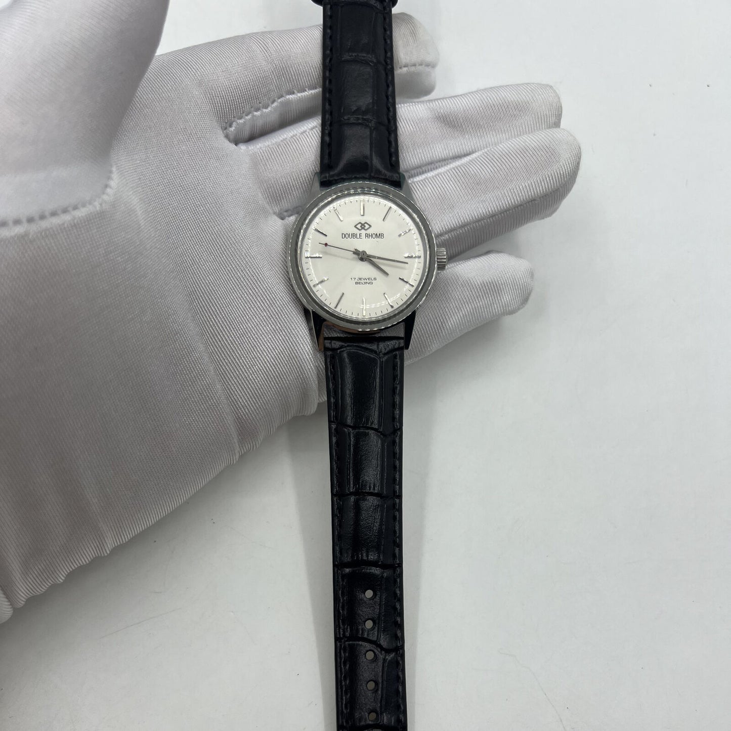 Beijing 36mm Double Rhomb manual watch with silver case, silver nail strap, classic minimalist style.