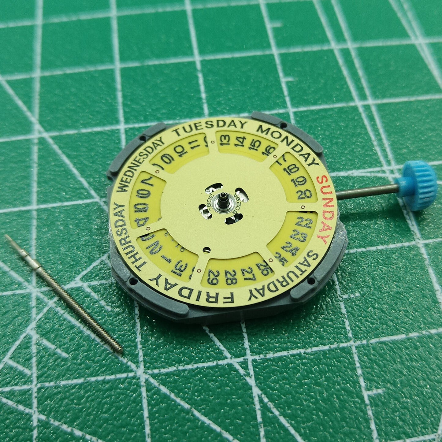 Miyota 6M50 Quartz Movement with golden dial and date at 3, perfect for watch customization.