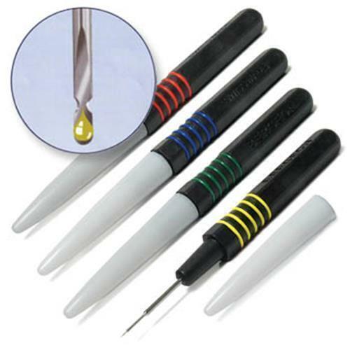 Bergeon 7013-4 metal dip oilers set for precise watch oiling with ergonomic grip, ideal for watch repair.