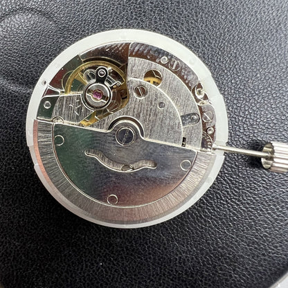 Tianjin Seagull T16 automatic watch with golden dial, day-date display, and mechanical movement.