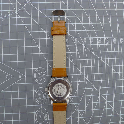 Beijing 36mm Double Rhomb watch with silver case and nail strap, manual mechanical movement, elegant design