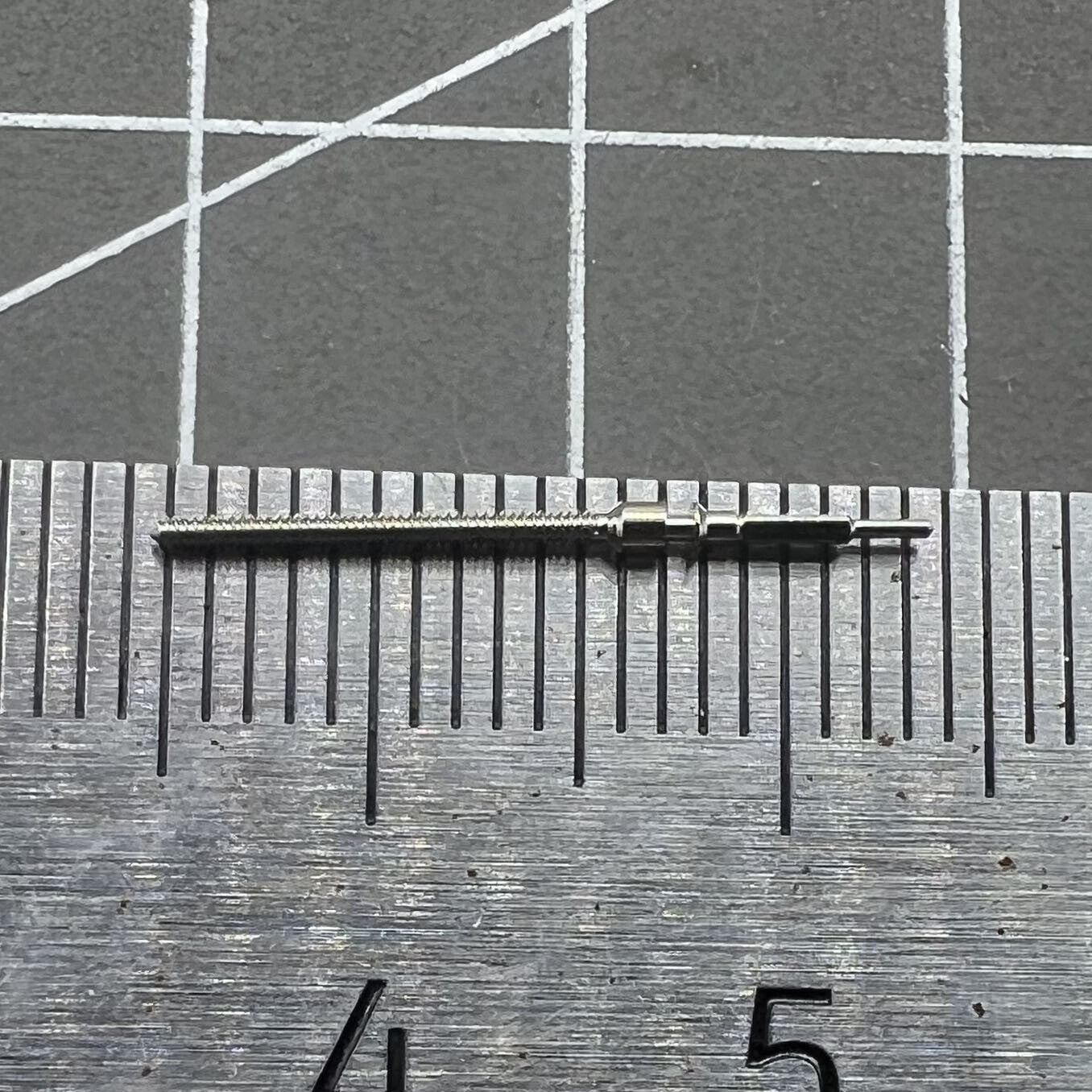Generic watch winding stem for Shanghai 7120 movement, compatible with multiple watch models, precise replacement part.