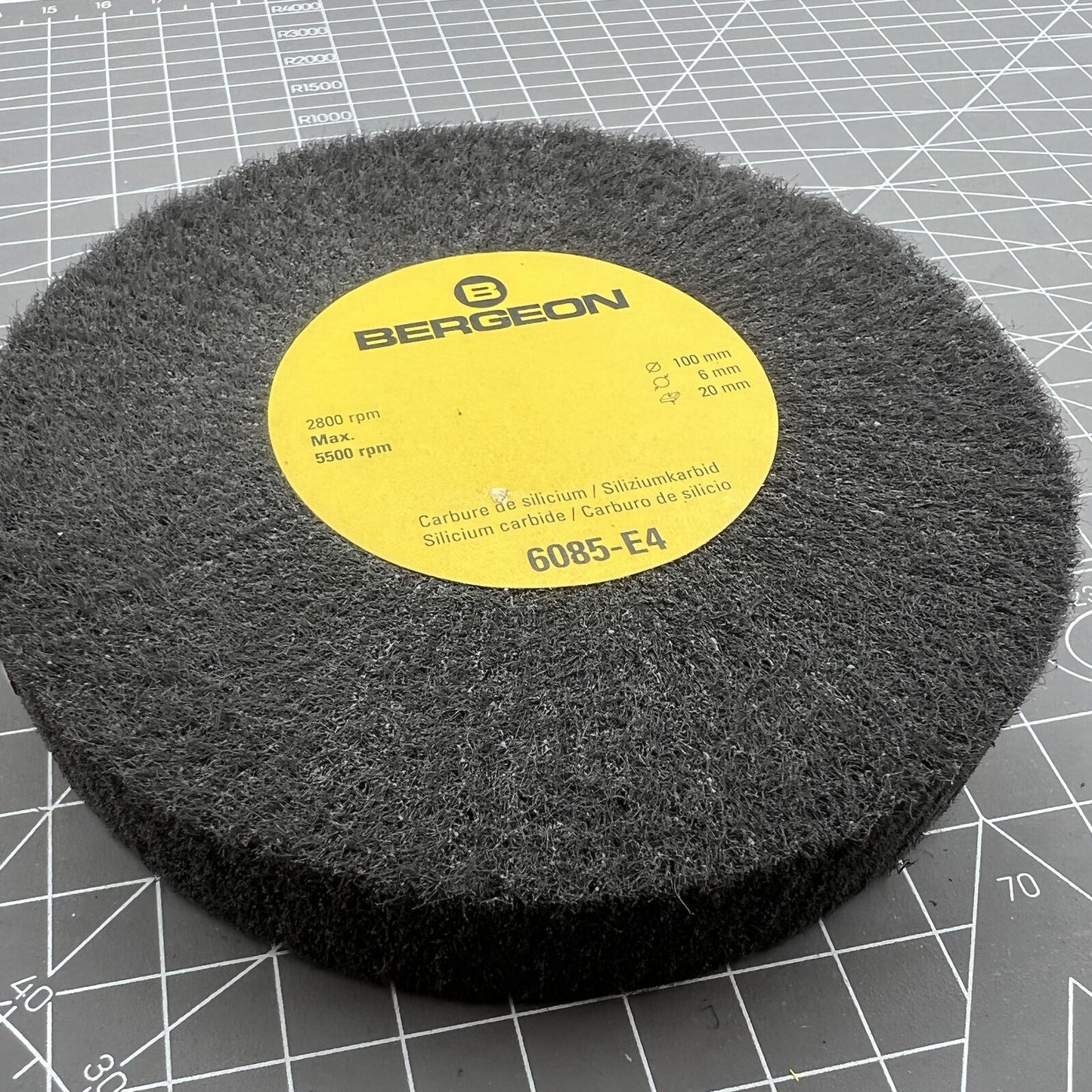 Swiss Bergeon 6085-E4 ultra fine abrasive satin metal finishing wheel for precise watch polishing.
