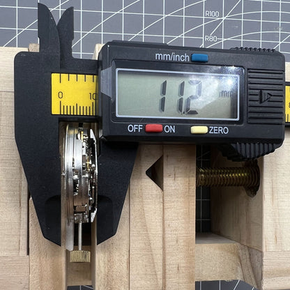 Asia Made 7750 mechanical watch movement with black dial, single calendar, and three small second subdials for precise timekeeping.