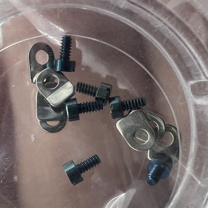 1. Assorted watch part casing clamps with screws for Seagull ST3600 and ETA6497 movements.  