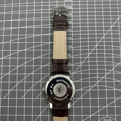 China Baihua 37mm manual mechanical watch with silver dial and 19-jewel movement, shock-resistant design for durability.