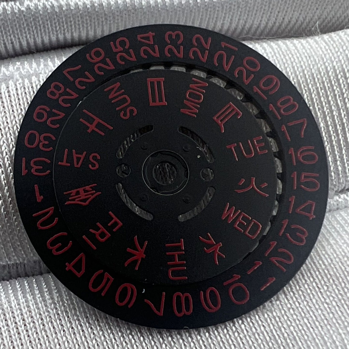 Red font date disk wheel for NH36 movement, date at 3.8, Japan Made for precise watch repair.