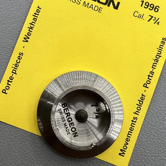 Bergeon 1996 Cal.7 3/4 movement holder with adjustable screw for secure watch repair.