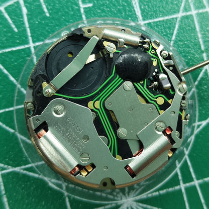Swiss ISA 8162 quartz watch movement with date display at 6, precision replacement for watch repairs.