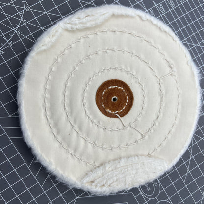 Swiss Bergeon 5175-150 white polishing buff wheel for precise watch finishing and detailing.