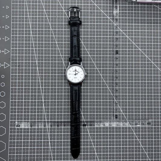 Beijing 31mm mechanical watch with black double rhomb strap, silver case, and three classic hands.