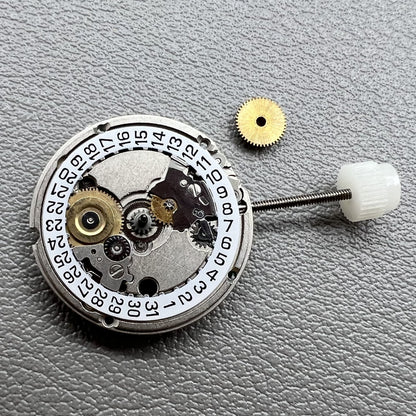 Swiss ETA 556115 quartz watch movement with 3 hands and date display at 3 o'clock, ideal for watch accessories.
