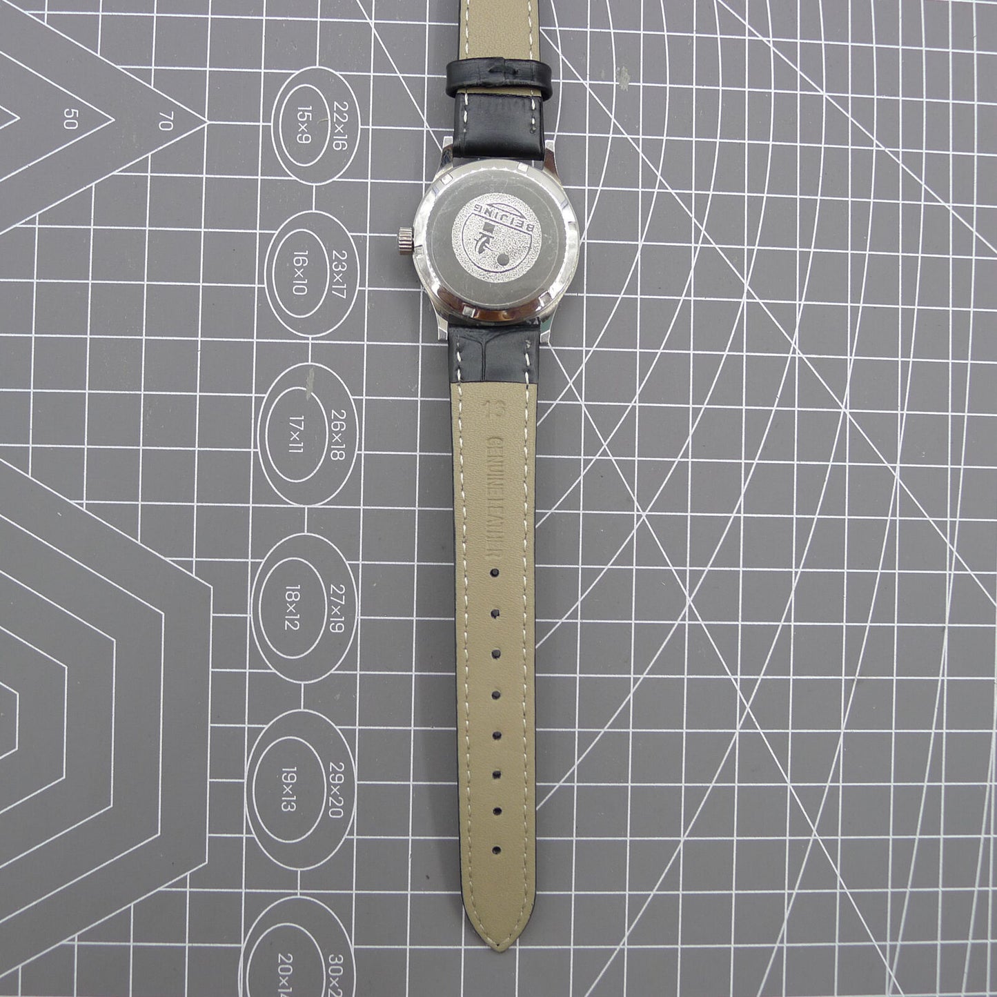 Silver 31mm Beijing Double Rhomb manual watch with three hands, elegant design for classic style.