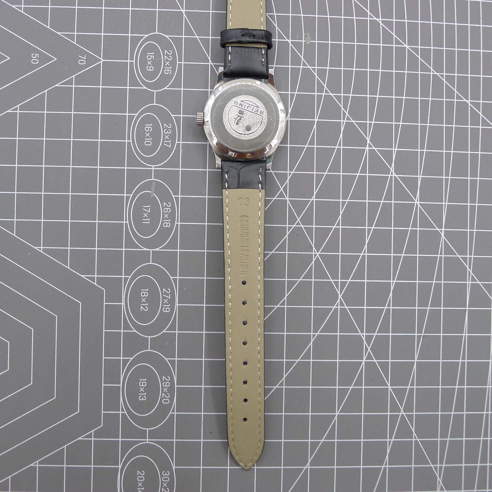 Silver 31mm Beijing Double Rhomb manual watch with three hands, elegant design for classic style.