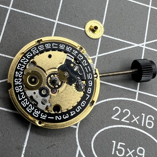 ETA 956.112 black dial watch with quartz movement, 3 hands, date at 3, perfect for daily wear.