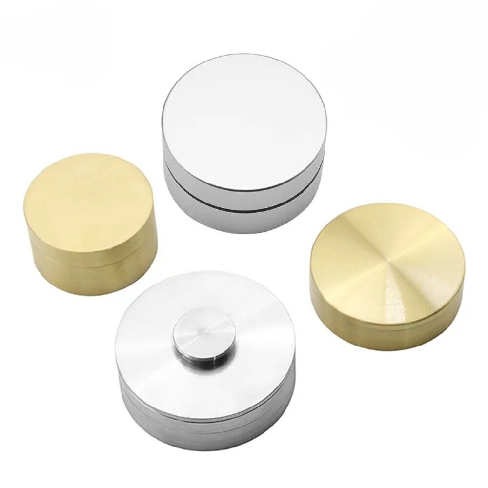 Steel and copper watch oil cylinder for precise watch repair and maintenance.