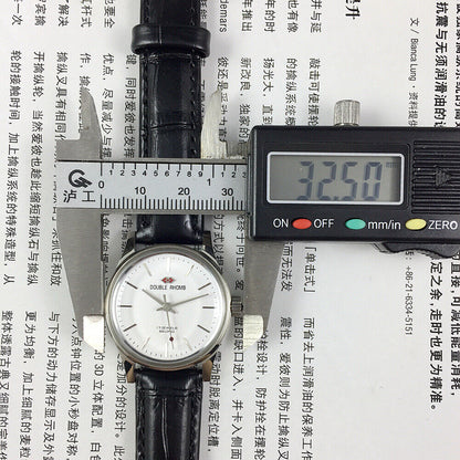 Beijing 31mm China-made manual mechanical watch with silver case and three hands, stylish and precise.