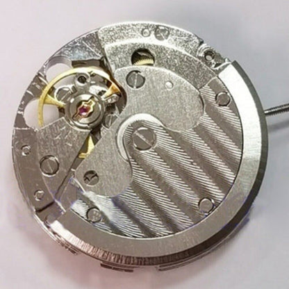 Silver Tianjin ST16 hollow automatic mechanical watch movement, precise timekeeping by China Made brand.
