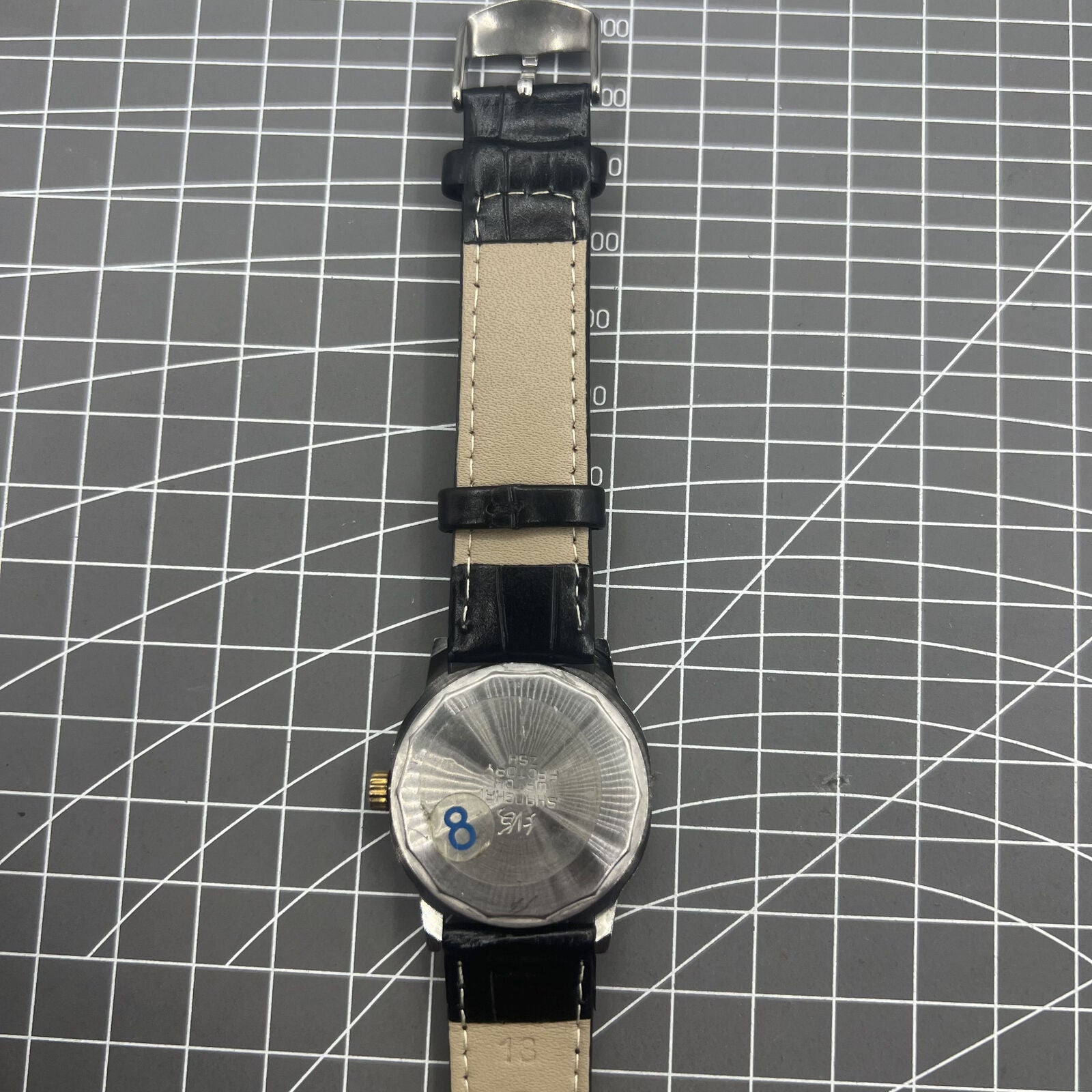 Shanghai Factory 34mm manual mechanical watch, black dial, 19 jewels, shock-resistant for durable everyday wear.