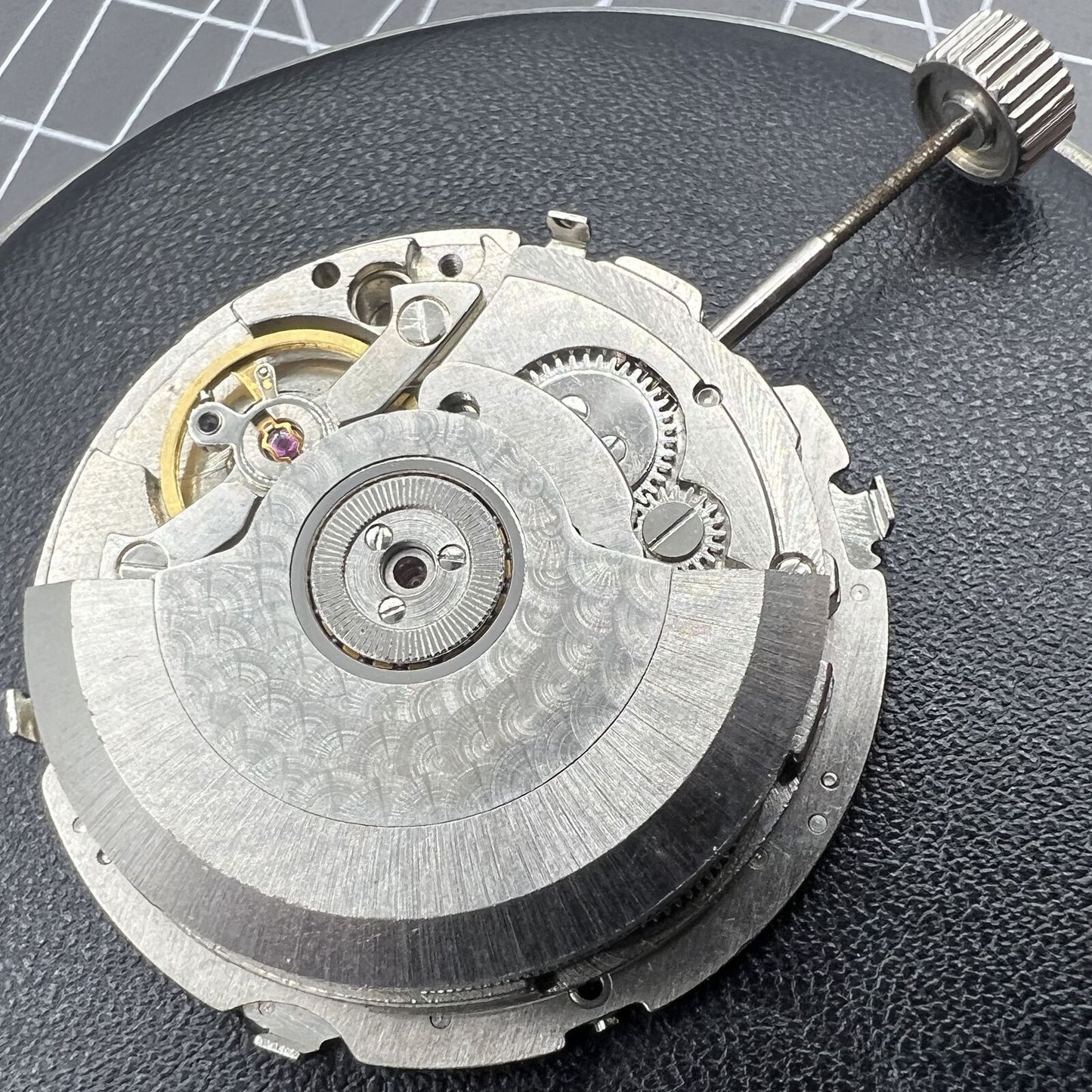 Tianjin Seagull ST25 automatic watch movement with three hands and big date, showcasing precise Chinese engineering.