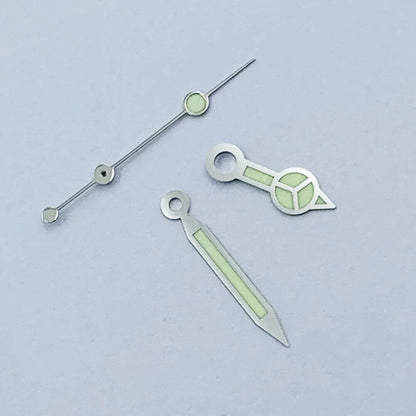 Green luminous watch hands with silver trim for NH35 NH36 movements, perfect for watch upgrades.