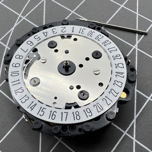 Hattori VD52B quartz watch movement with date display at 6 o'clock, precise timekeeping part